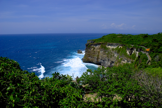 Uluwatu Temple perched on a cliff at sunset