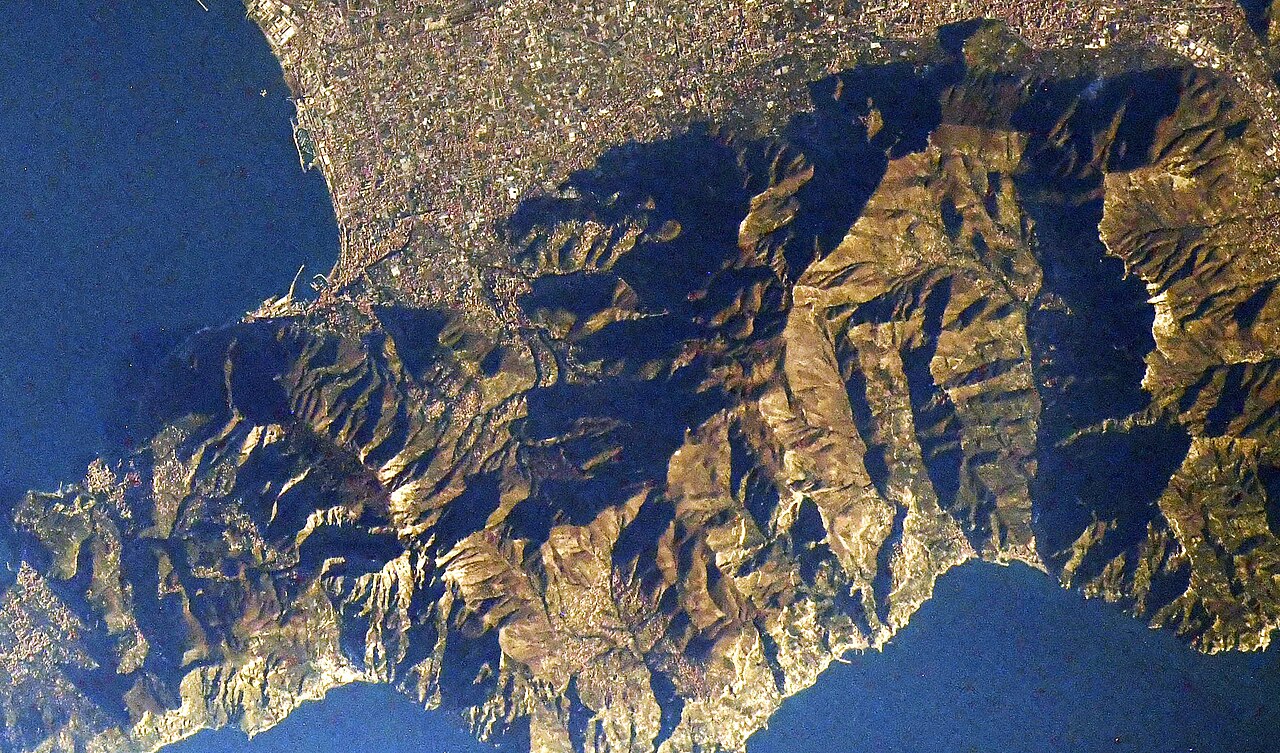 Rolling hills and cypress trees in the Tuscan countryside