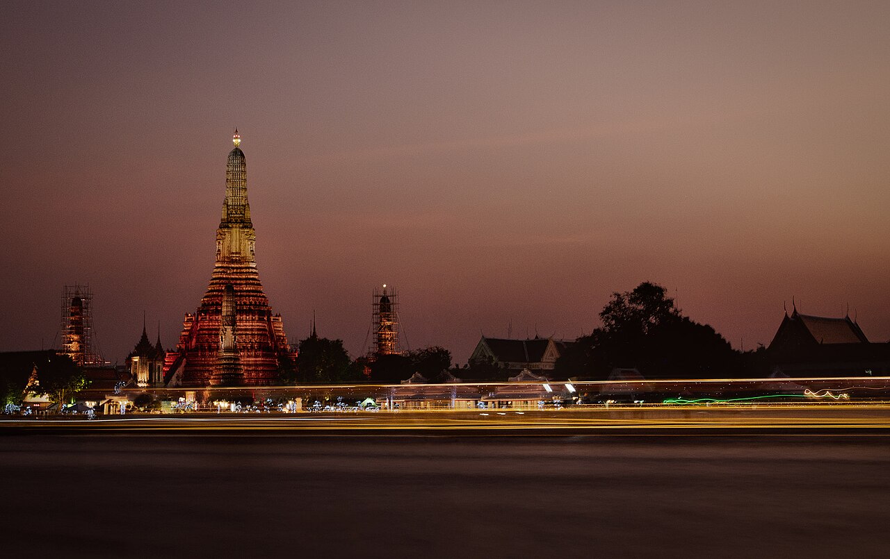 Grand Palace golden spires against a blue sky in Bangkok