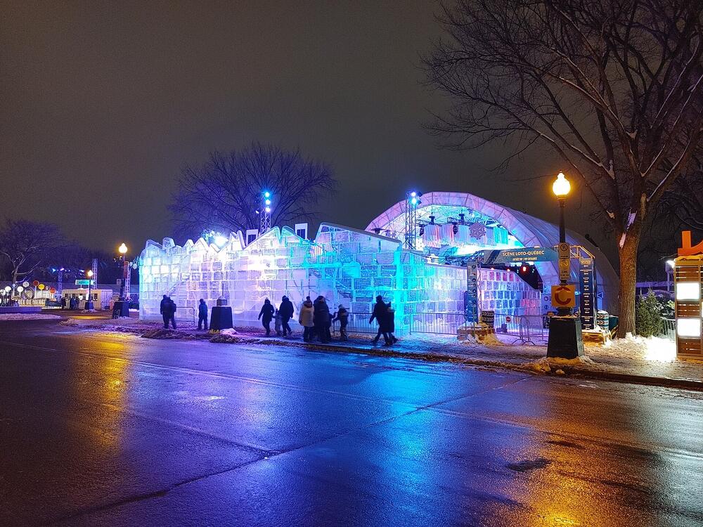 The lit ice palace at the Carnaval de Québec, February 2023