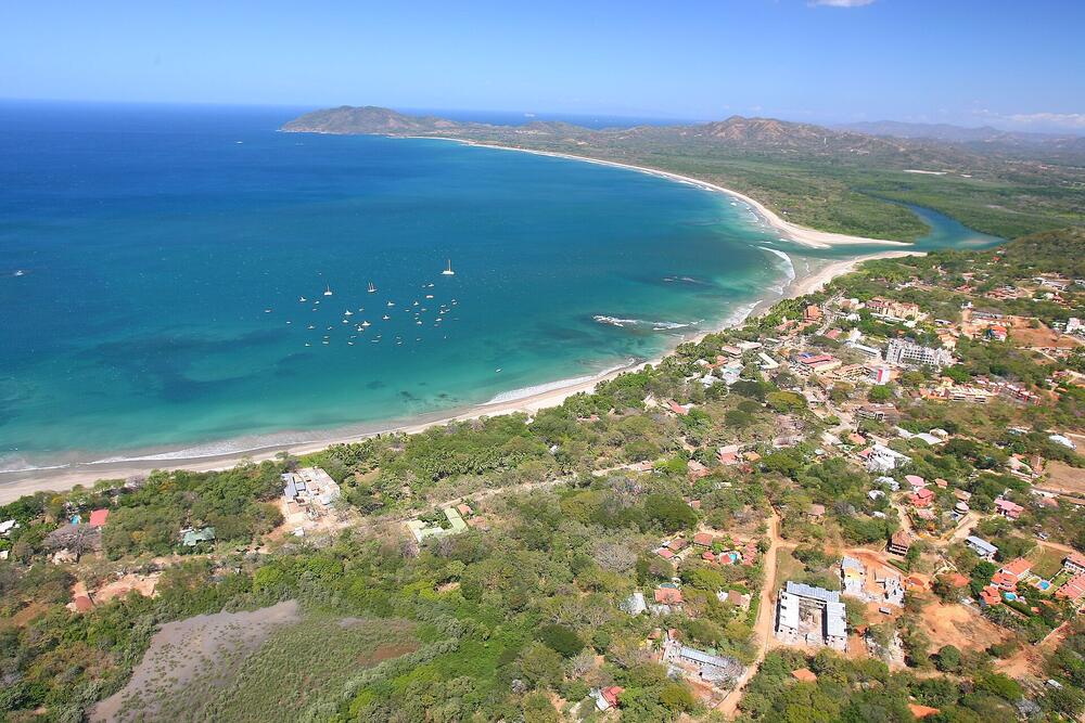 Aerial view of Tamarindo town, Tamarindo Bay and Playa Grande (January)