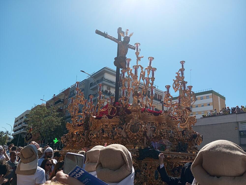 The paso of the Cristo de la Sed in the street during Seville's Semana Santa, 2026
